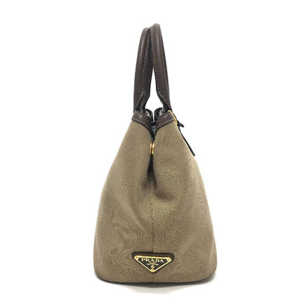 Pre-owned PRADA canvas bag with leather handles and iconic logo detail