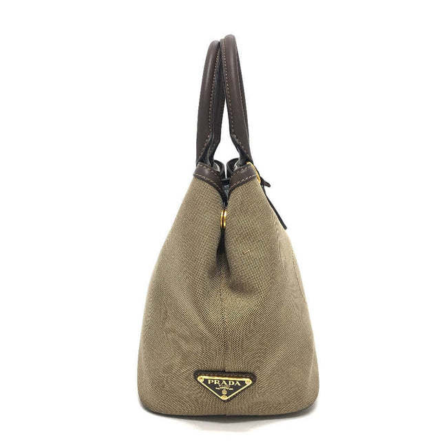 Pre-owned PRADA canvas bag with leather handles and iconic logo detail