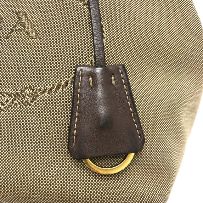 PRADA pre-owned bag featuring a textured exterior and elegant leather detailing