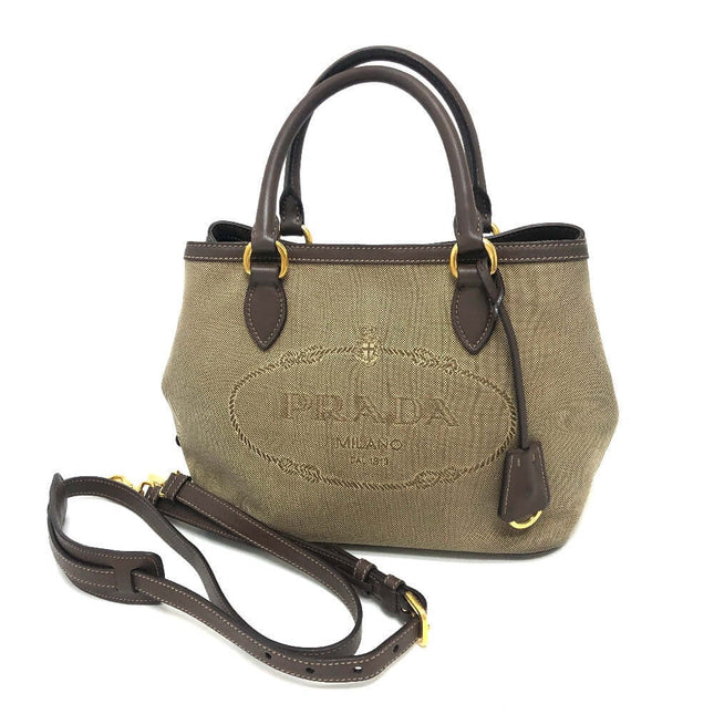 PRADA pre-owned canvas handbag with leather accents and detachable shoulder strap