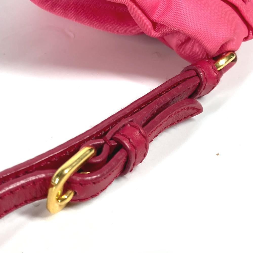 PRADA vintage pink bag with a stylish gold clasp and smooth leather strap