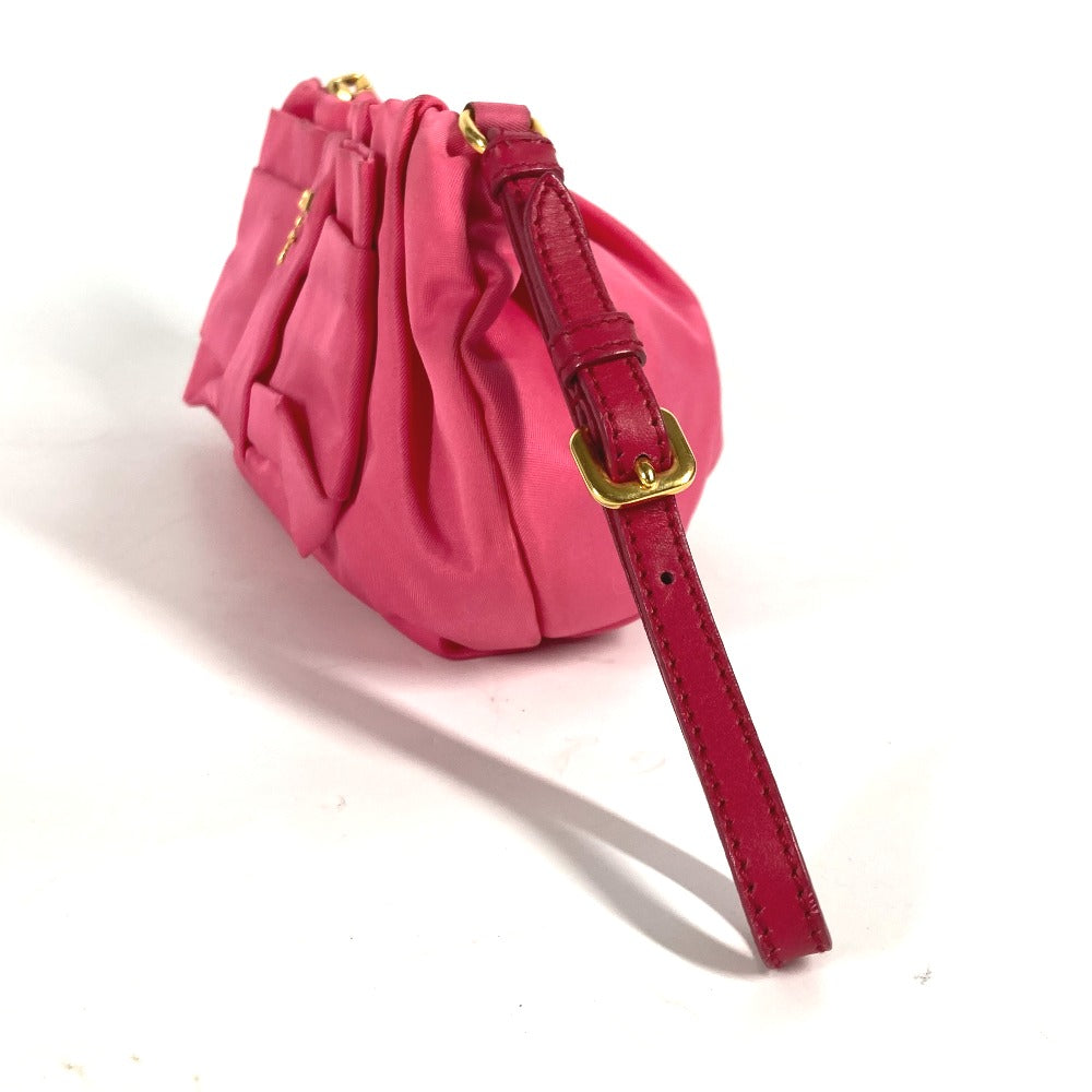 PRADA vintage pink clutch bag with gathered design and adjustable strap for stylish outings