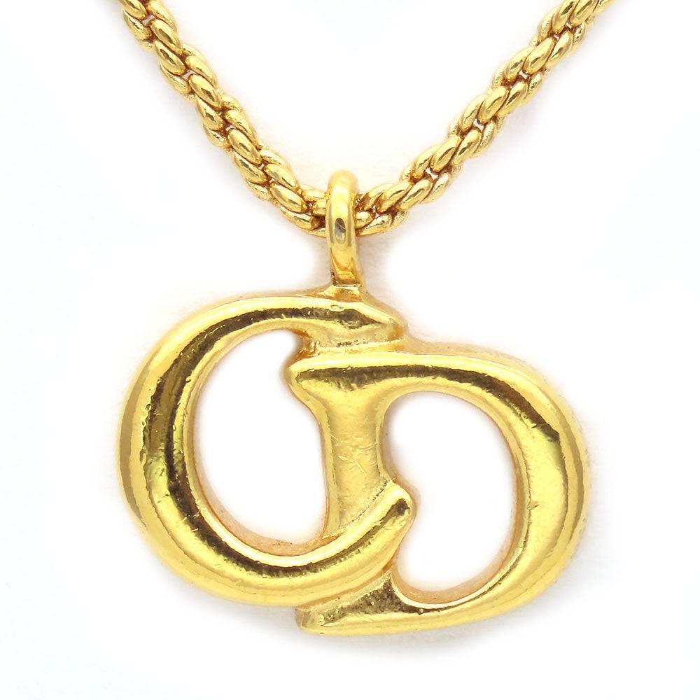 Pre-loved Christian Dior gold-tone necklace featuring iconic logo pendant with twisted chain design