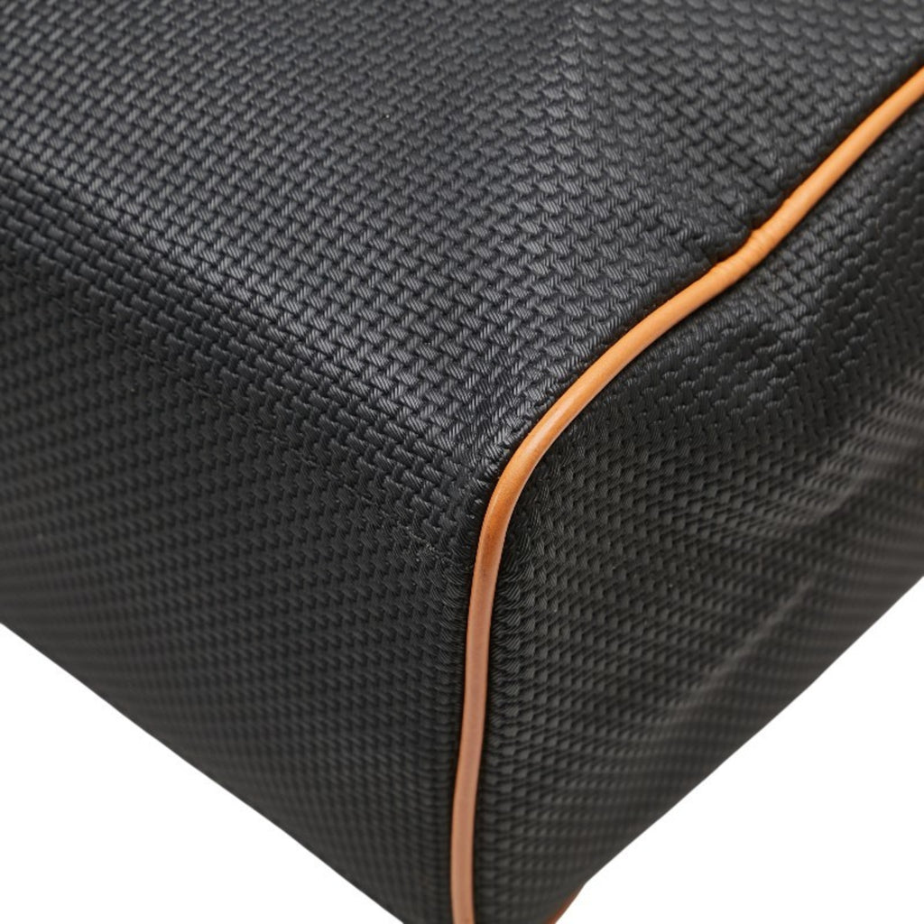 Close-up of the MANSII pre-loved Saint Laurent mini Boston bag showcasing its textured black material and orange accents