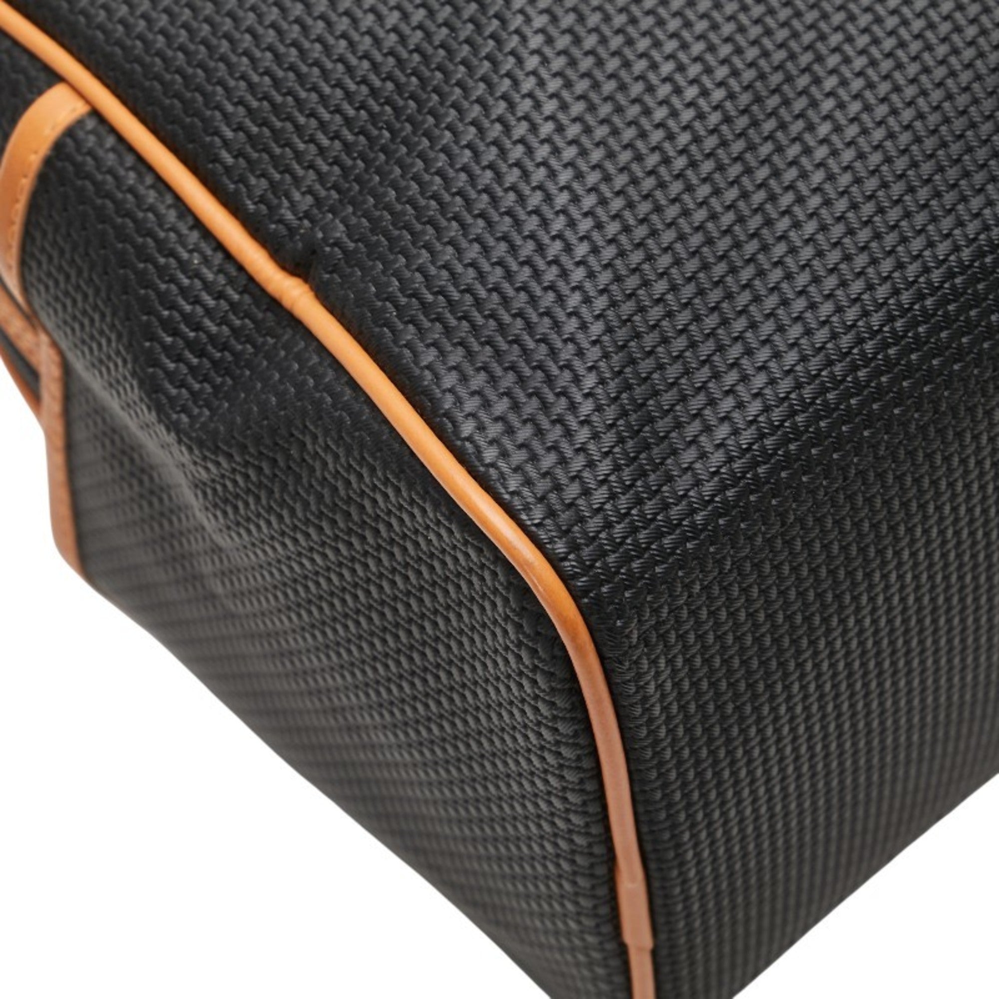 Close-up view of a pre-loved Saint Laurent mini Boston bag with a textured black exterior and orange trim