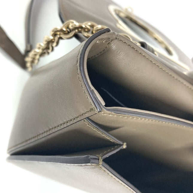 Inside view of a pre-owned Salvatore Ferragamo bag with spacious compartments and elegant design