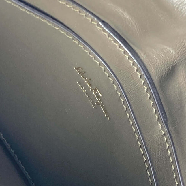 Inside view of pre-owned Salvatore Ferragamo leather bag with elegant stitching details