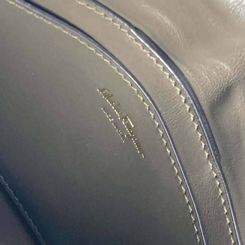 Inside view of pre-owned Salvatore Ferragamo leather bag with elegant stitching details