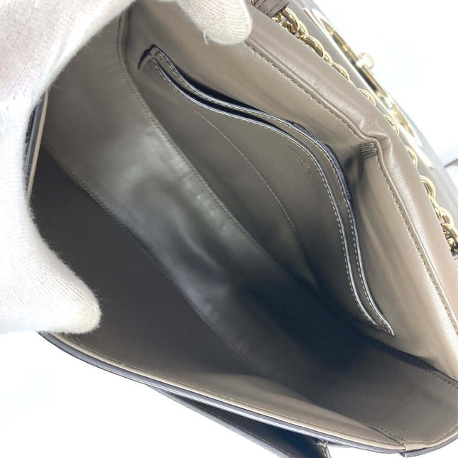 Inside view of a pre-owned Salvatore Ferragamo bag featuring spacious compartments and elegant design