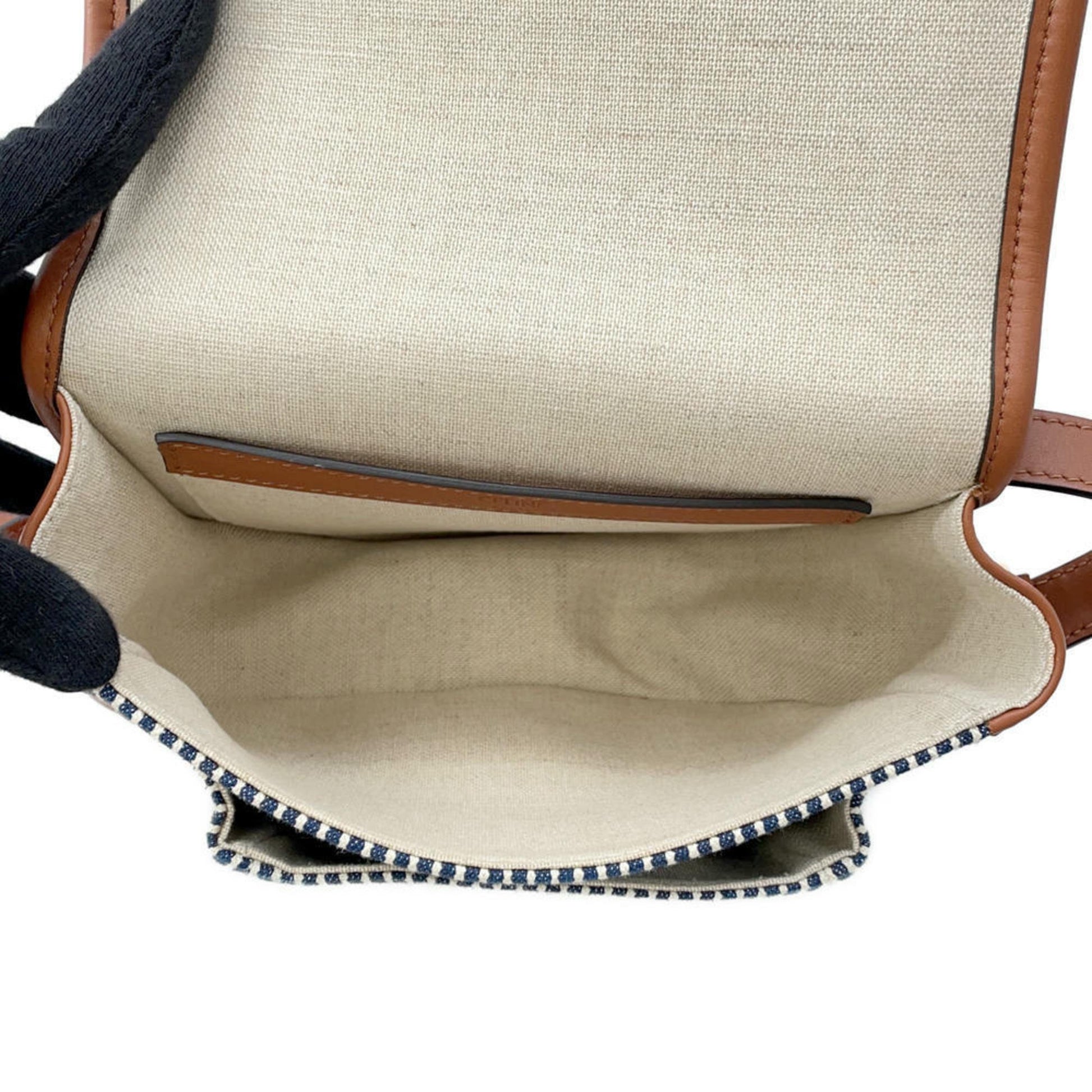 Celine Pre-Owned bag interior view featuring a spacious compartment with a pocket for organization