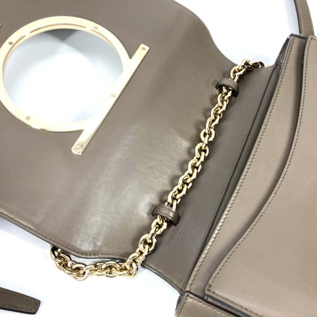 Salvatore Ferragamo pre-owned bag with a chic circular handle and elegant gold chain strap