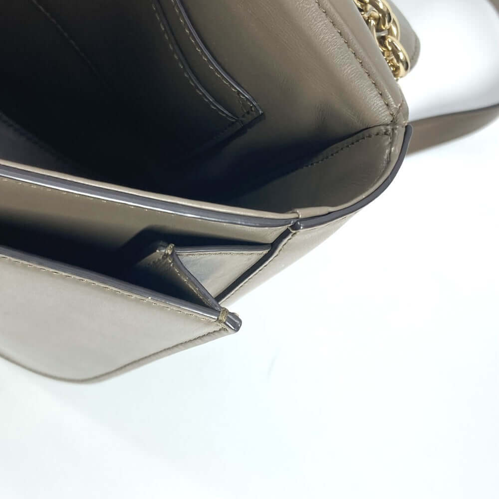 Interior view of Salvatore Ferragamo pre-owned bag showing compartments and high-quality leather finish