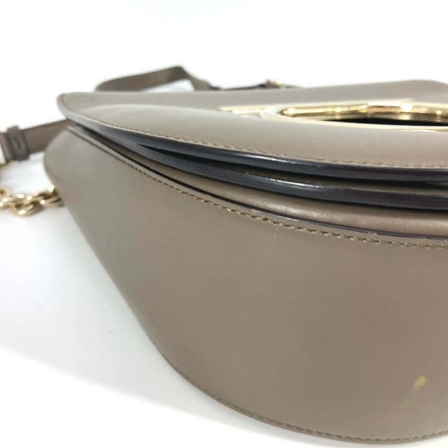 Salvatore Ferragamo pre-owned handbag in beige leather with elegant design and gold accents