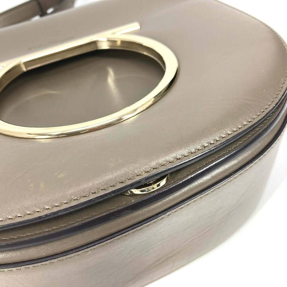 Salvatore Ferragamo pre-owned bag in elegant gray with gold-tone handle and zipper detail