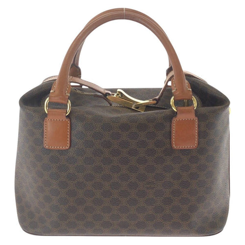 CELINE Pre-owned handbag in brown with hexagonal pattern and leather handles for stylish everyday use