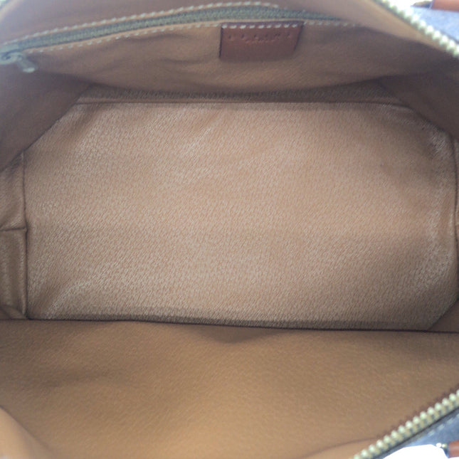 Interior of a CELINE pre-owned bag featuring a spacious compartment with soft lining
