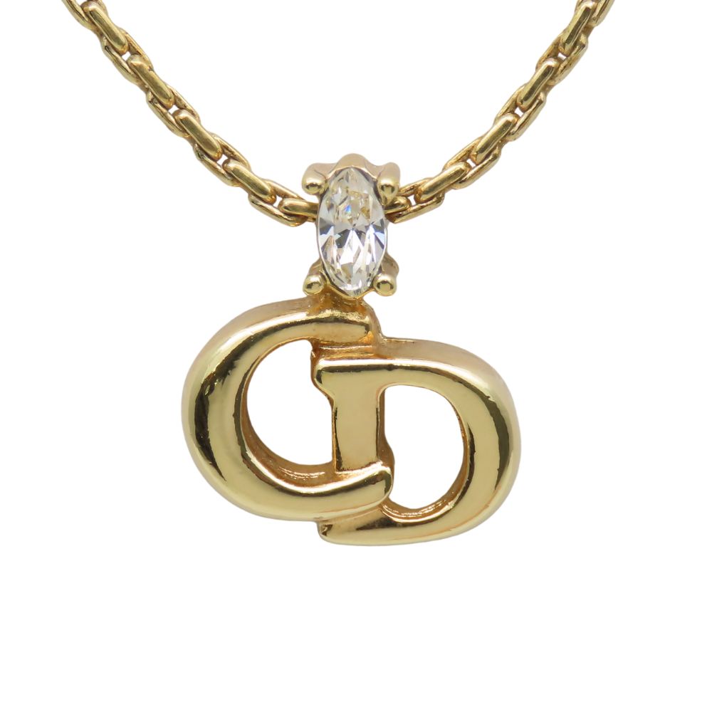 Elegant pre-owned Christian Dior gold necklace featuring a classic logo pendant with crystal embellishment