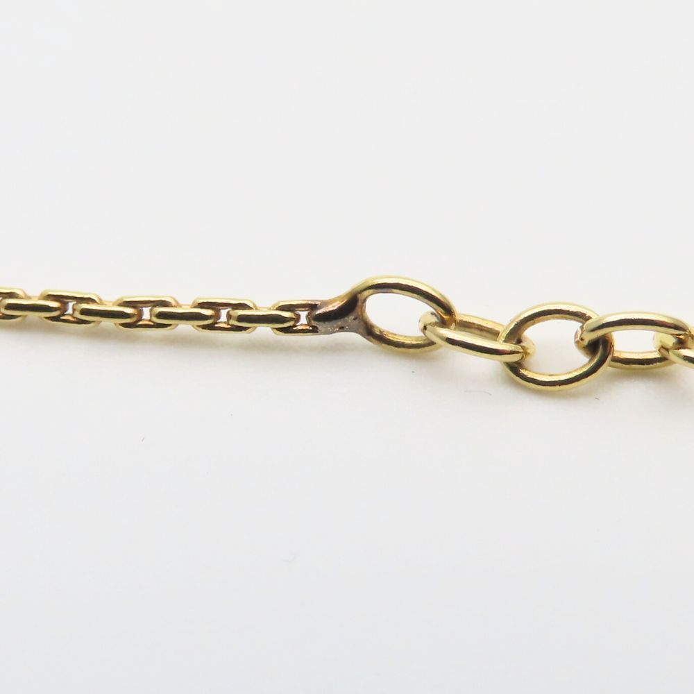 Close-up of a pre-owned Christian Dior gold necklace chain showcasing its elegant design