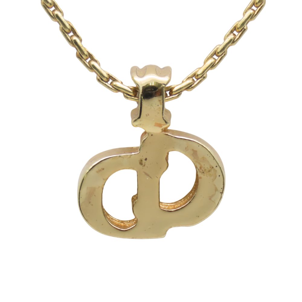 Pre-owned Christian Dior gold necklace featuring a unique logo pendant on a delicate chain