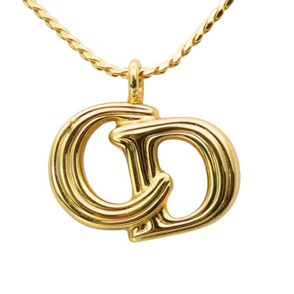 Christian Dior pre-owned gold CD pendant necklace with a twisted chain design