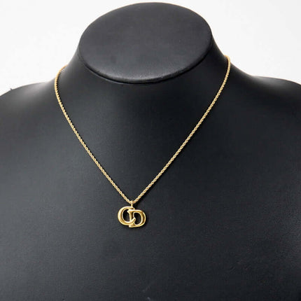 Christian Dior pre-owned gold necklace featuring the iconic CD logo on a delicate chain