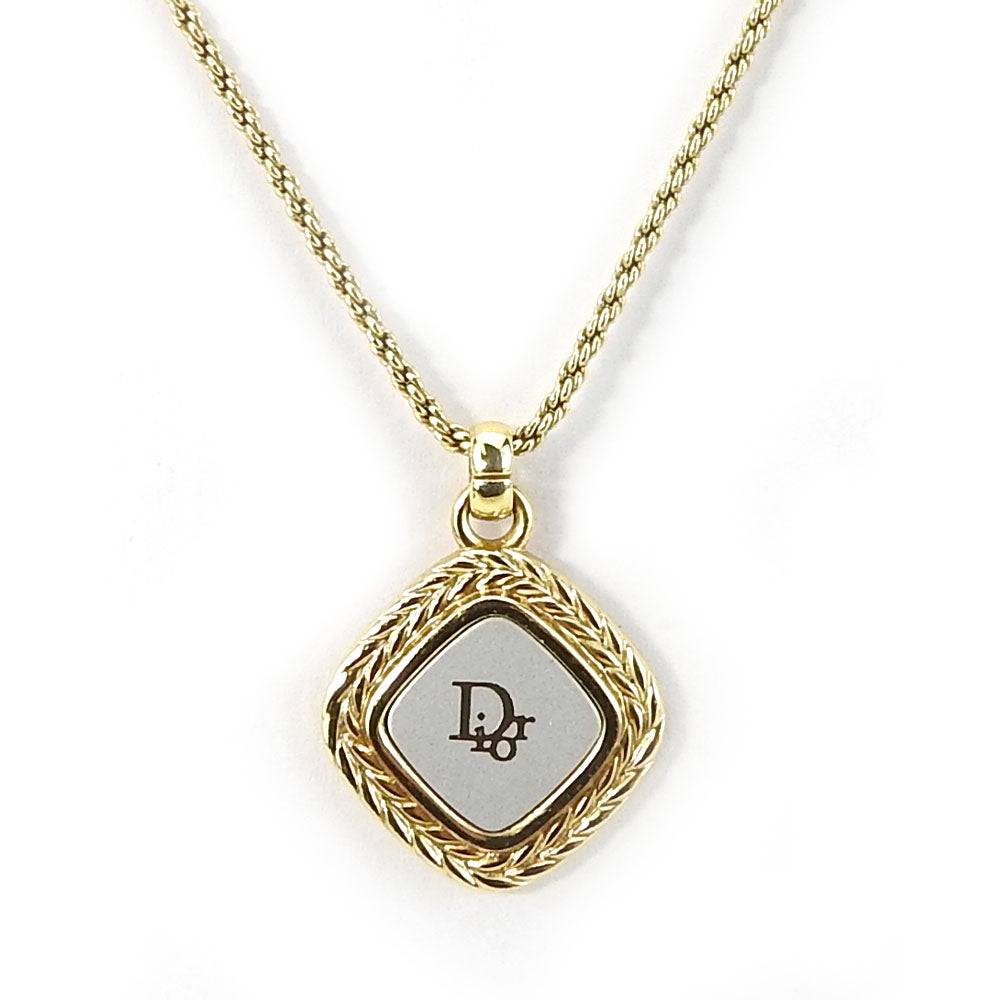 Christian Dior pre-owned gold pendant necklace with a unique logo design