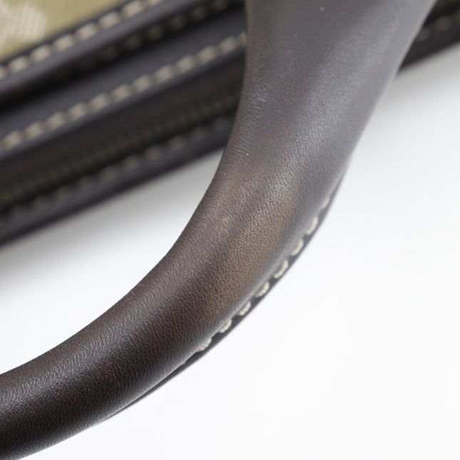 Close-up of CELINE pre-owned bag handle showcasing high-quality leather craftsmanship
