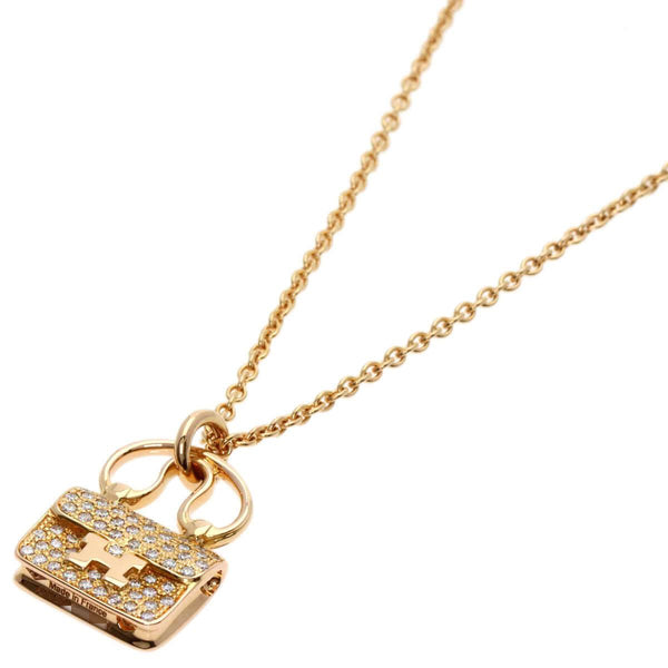 Pre-owned Hermes necklace featuring a gold-toned chain and sparkling handbag pendant