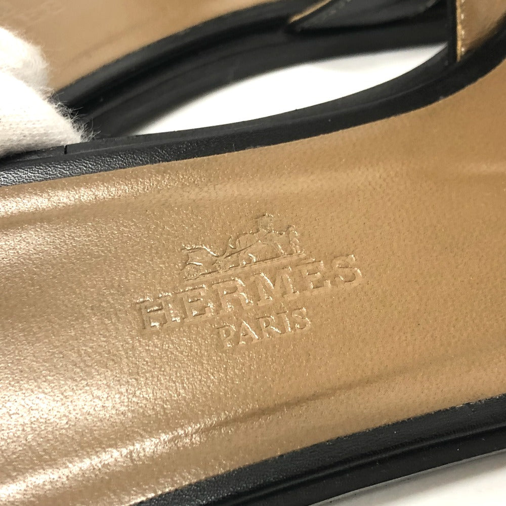 Close-up of the pre-owned Hermes Oran sandals showing the brand logo and elegant design detail