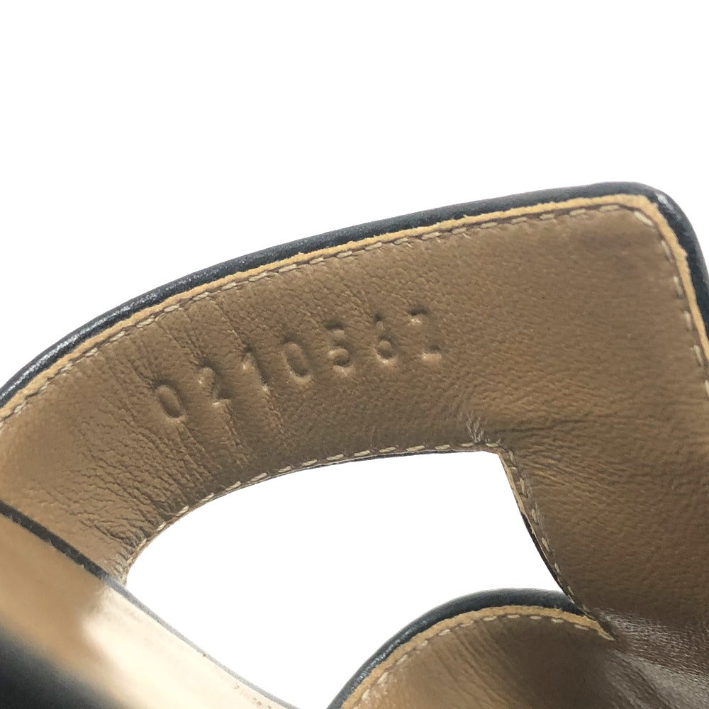 Close-up of pre-owned Hermes Oran sandals with detailed stitching and quality leather finish