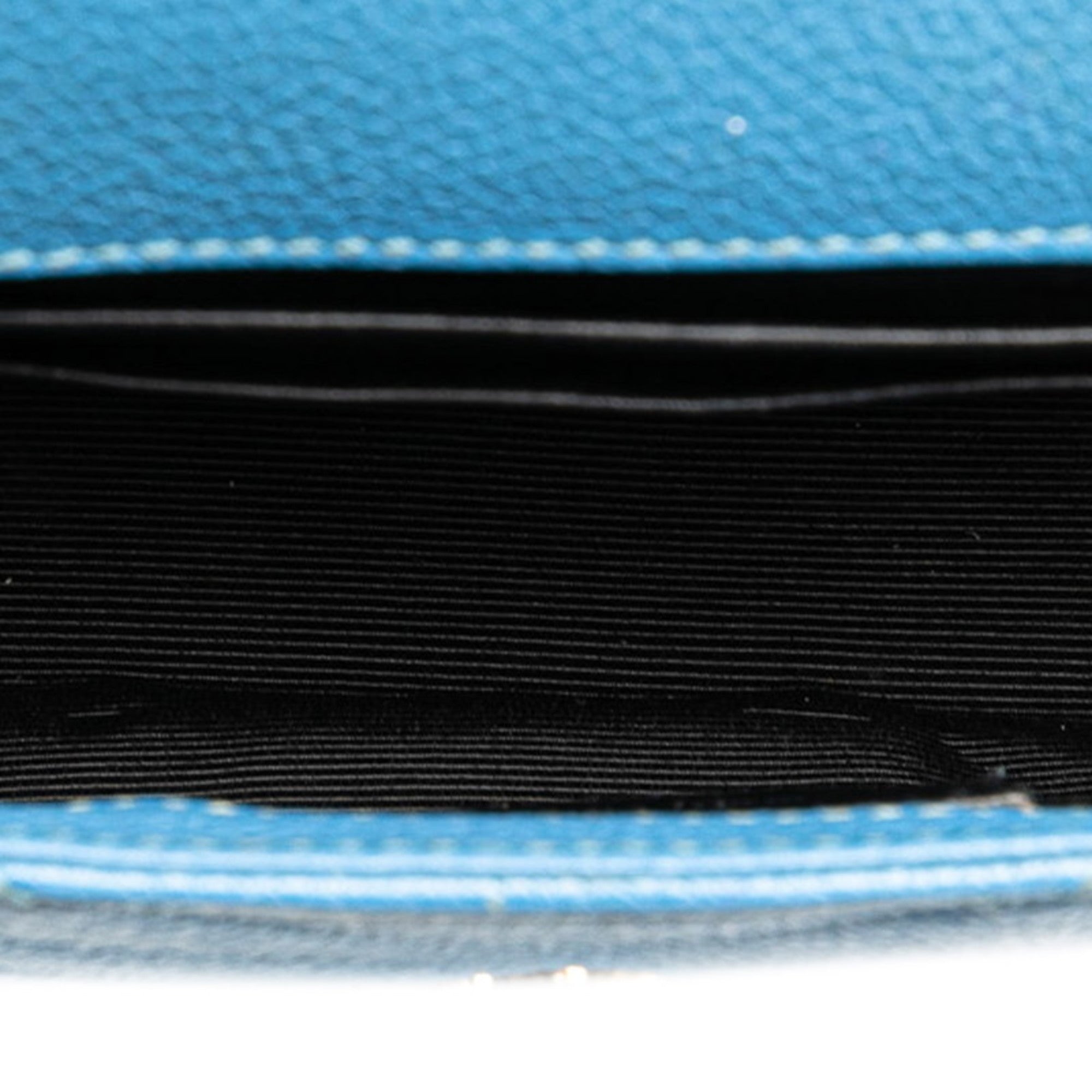 Interior view of pre-owned Saint Laurent Baby Chai bag showcasing stylish black lining and spacious design