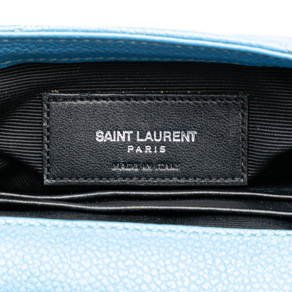 Close-up of the interior label of a pre-owned Saint Laurent Baby Chai bag showcasing premium craftsmanship