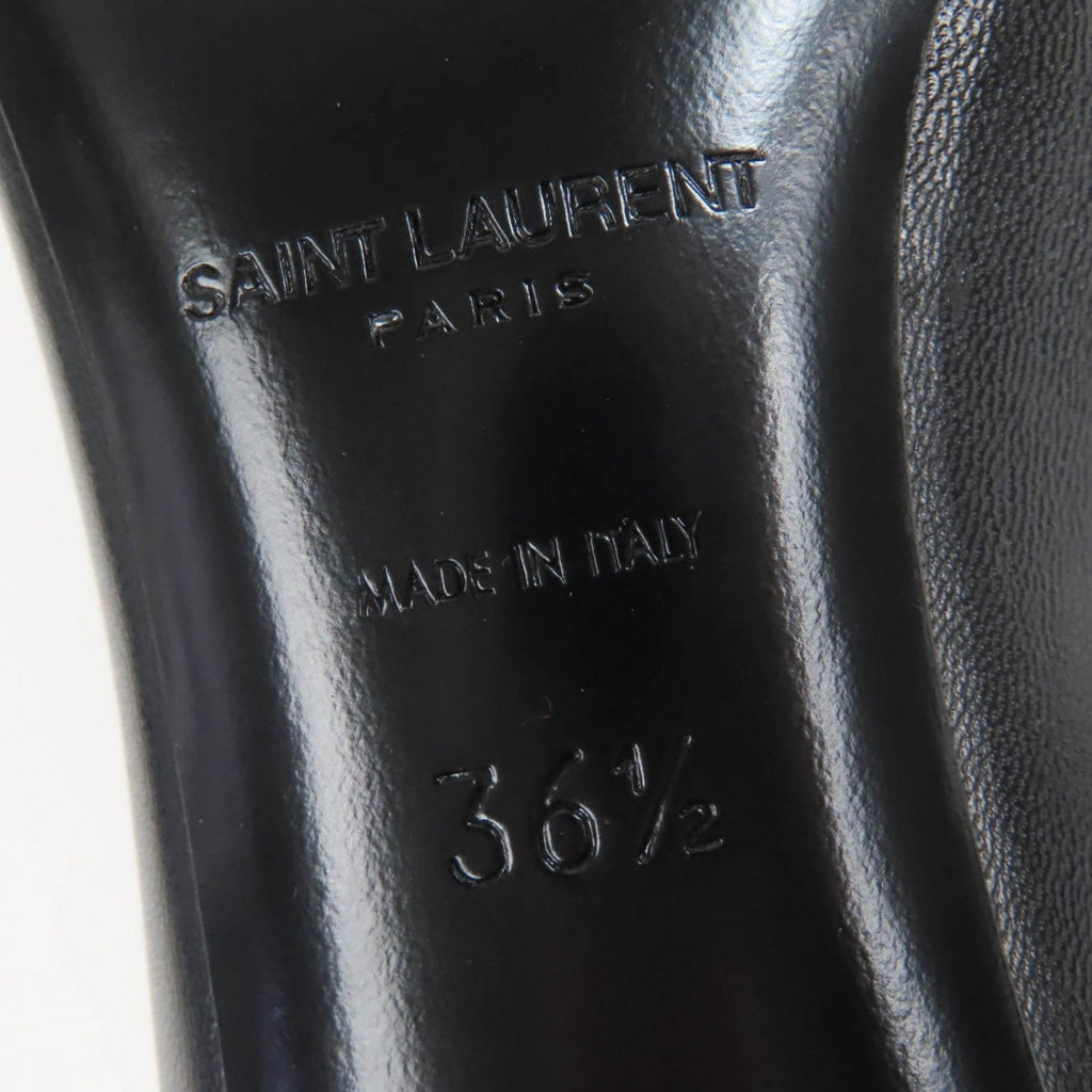 Close-up of SAINT LAURENT Paris black heels showcasing impeccable craftsmanship and elegant design