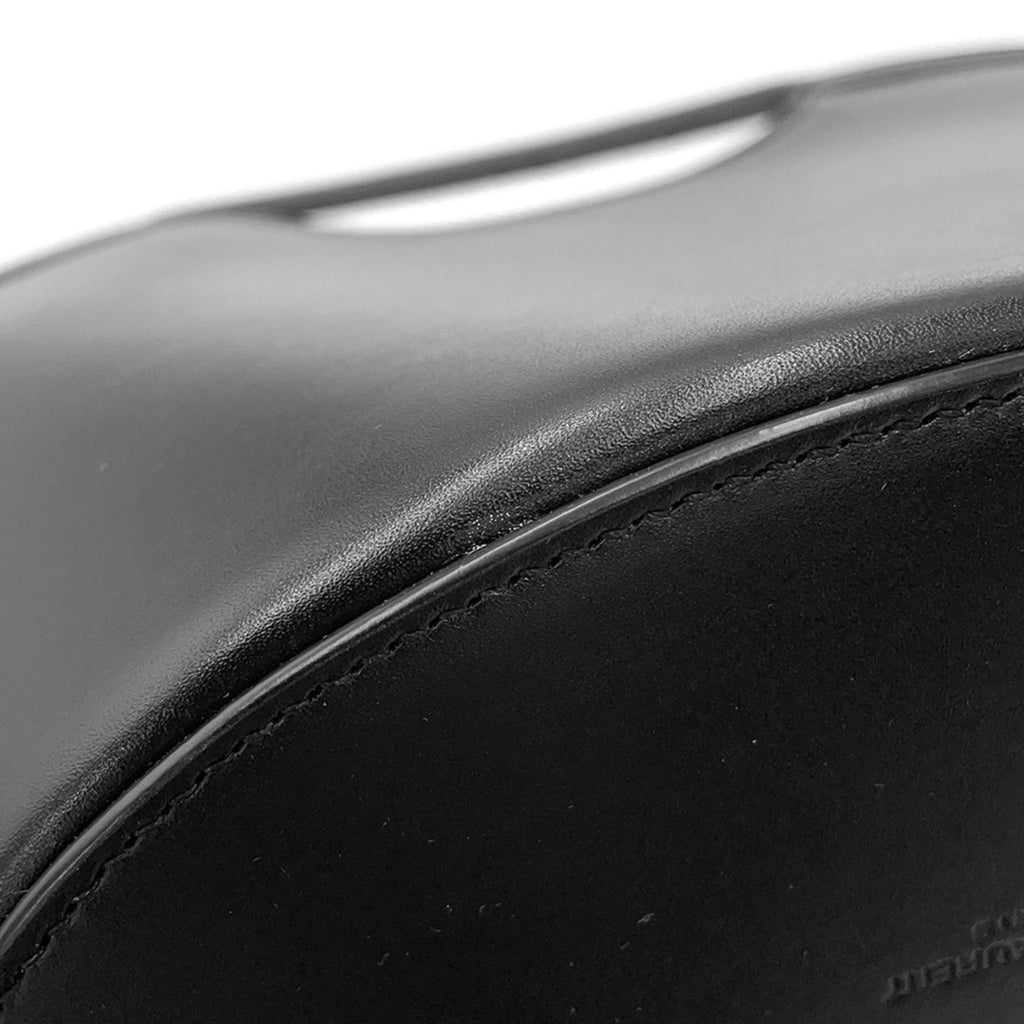 Close-up of MANSII SAINT LAURENT Seria Mini 2 way bag in black, highlighting premium leather texture