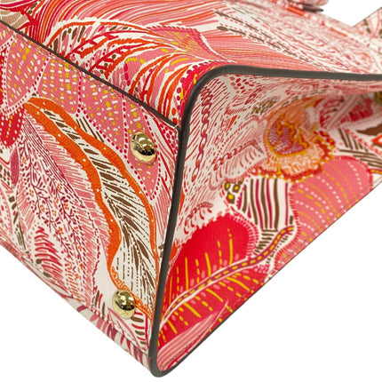 Salvatore Ferragamo pre-owned handbag featuring a vibrant floral design in pink and red tones
