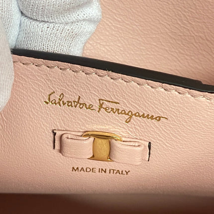 Salvatore Ferragamo pre-owned bag in pink leather showcasing brand logo and craftsmanship details