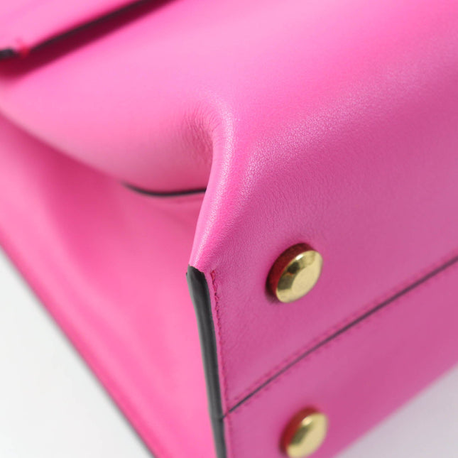 Salvatore Ferragamo pre-owned pink leather bag featuring gold hardware and sleek design