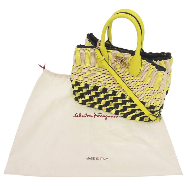 Salvatore Ferragamo pre-owned woven handbag in yellow and black with dust bag for stylish storage