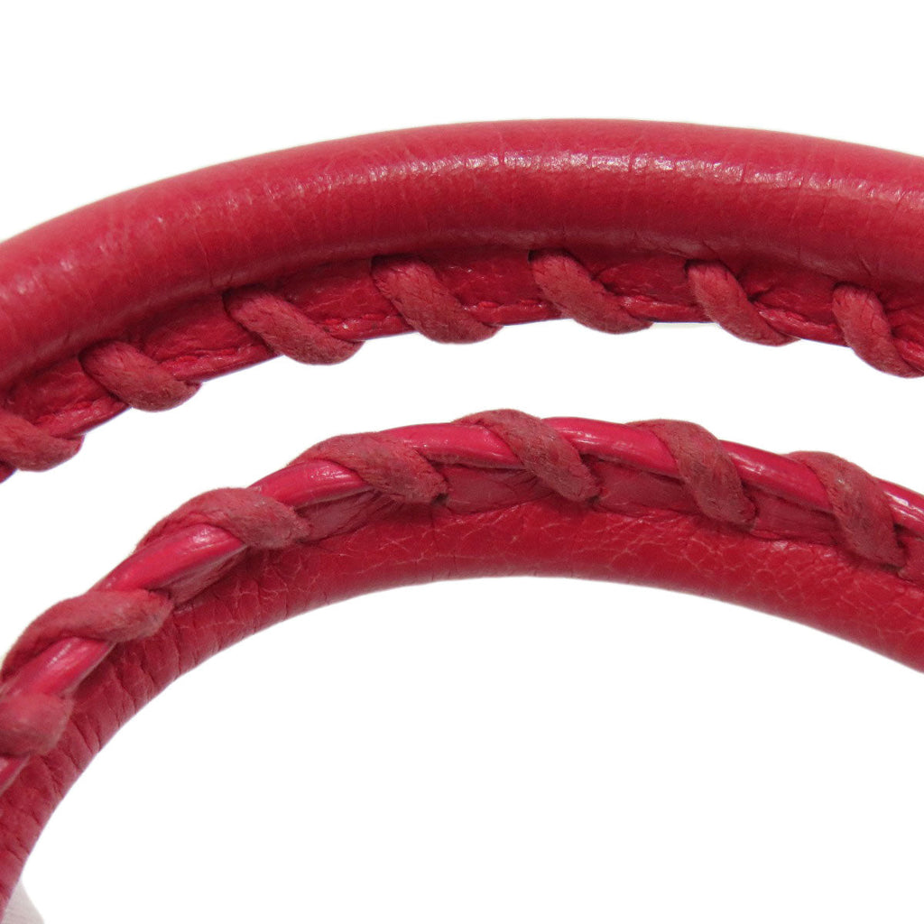 Balenciaga second hand red braided bag handles showcasing premium craftsmanship