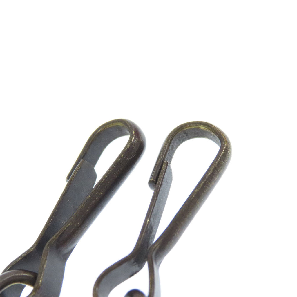 BALENCIAGA bag with stylish clips, available as a second hand item for fashion enthusiasts