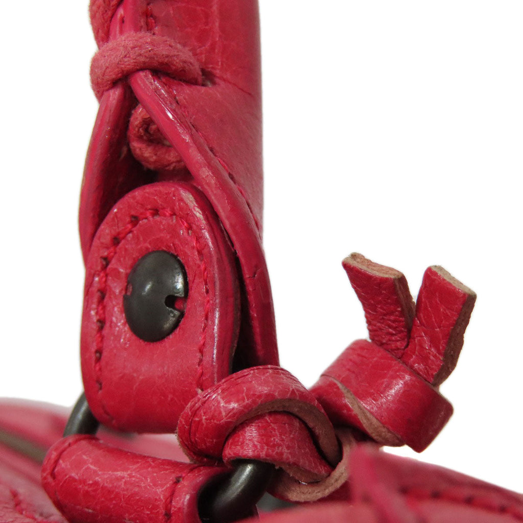 Close-up of a second hand Balenciaga bag featuring intricate leather details and unique hardware