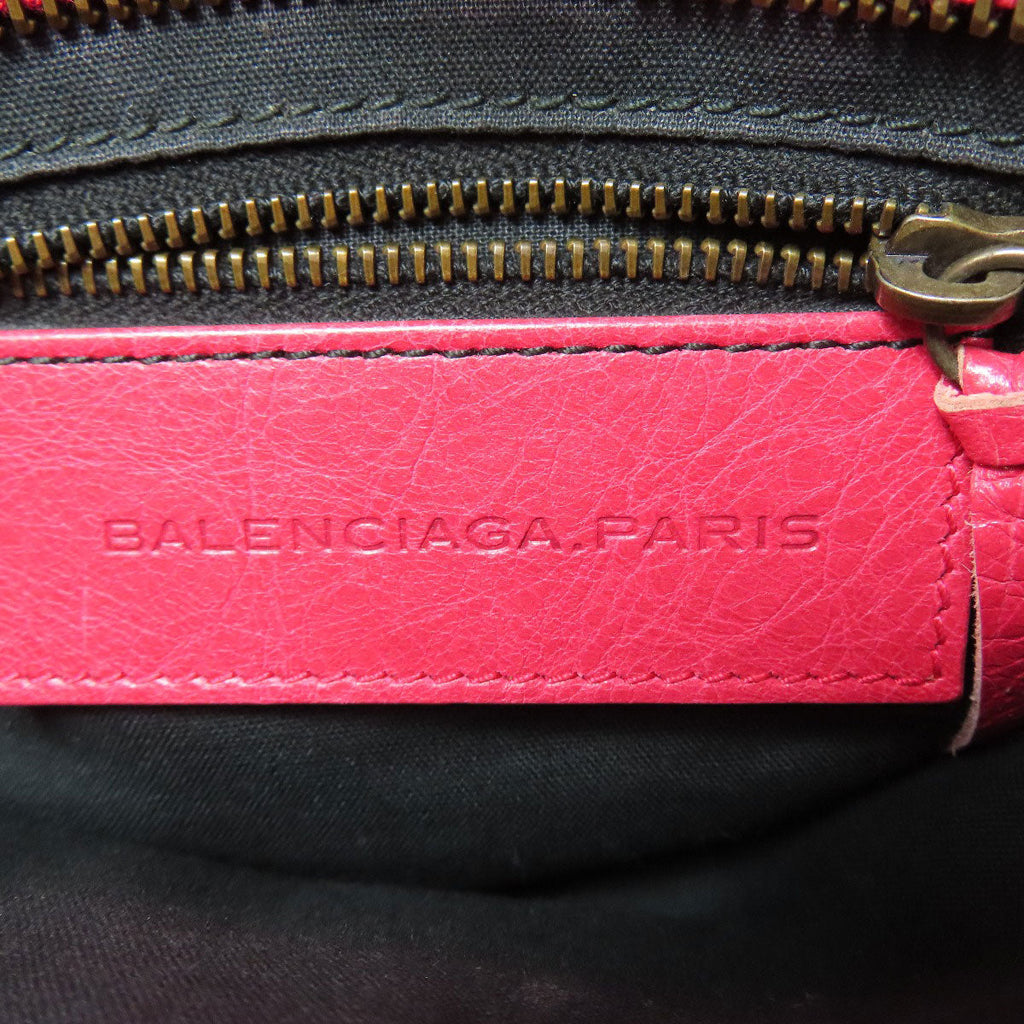 BALENCIAGA second hand bag interior showing the brand logo and zipper details