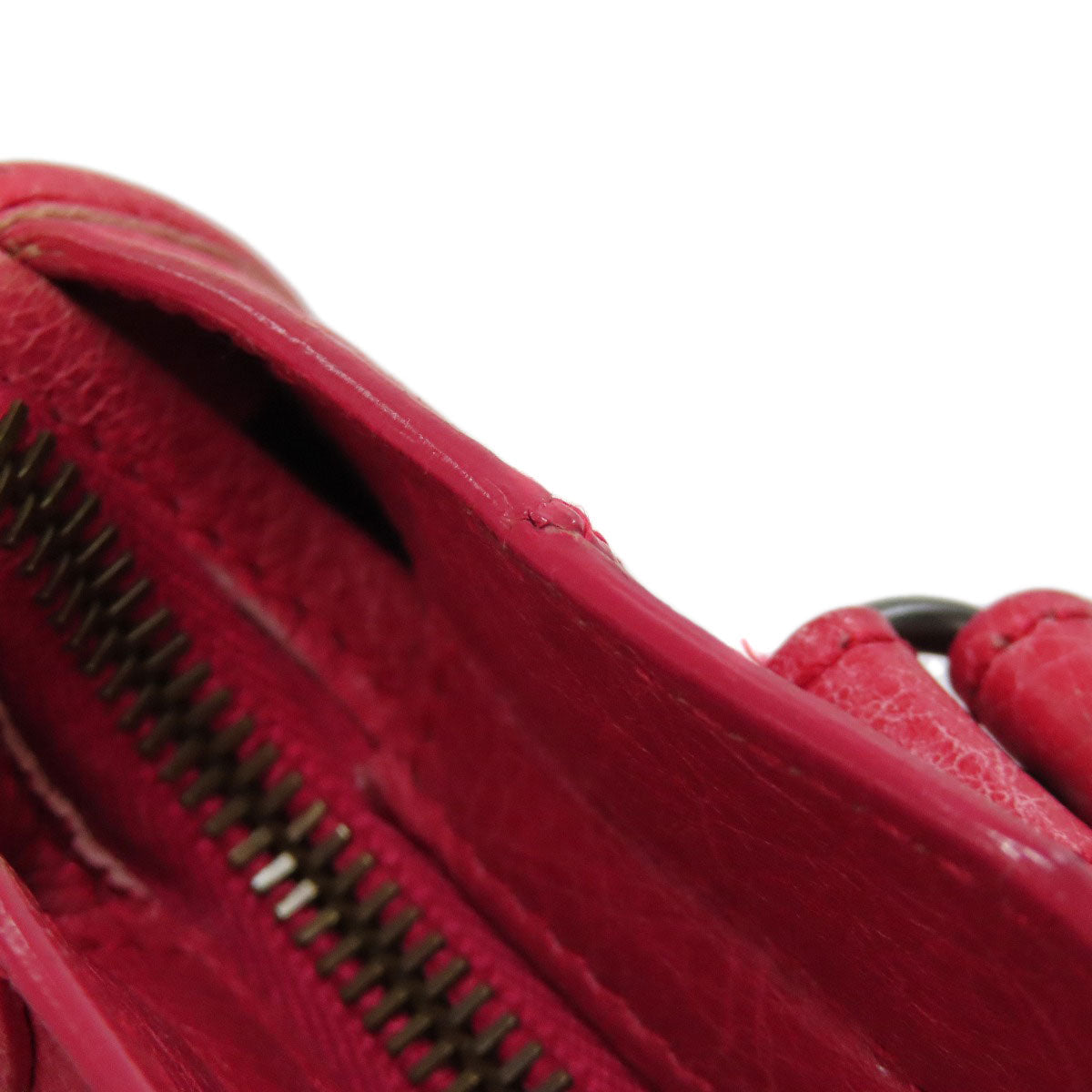 Second hand Balenciaga red leather bag featuring a spacious interior and zipper detail