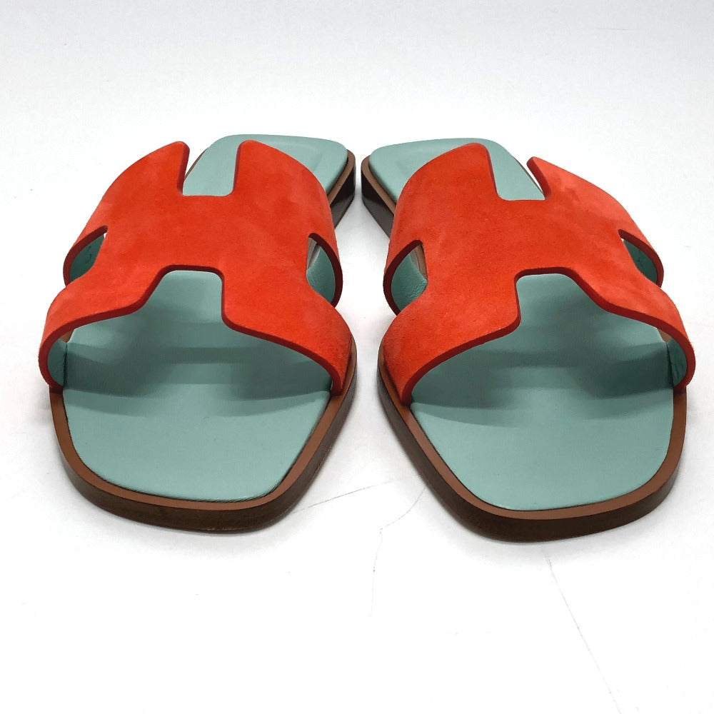 HERMES second hand orange suede sandals with a stylish H cut-out design and mint green soles