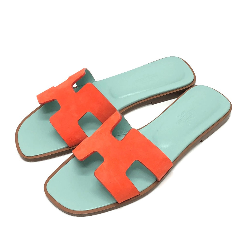 HERMES second hand sandals in vibrant orange and mint green with stylish design for summer wear