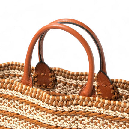 Valentino Garavani pre-owned woven bag with leather handles and intricate design