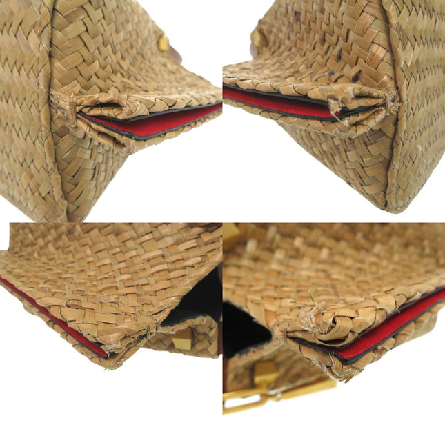 Valentino Garavani pre-owned woven bag with a unique triangular shape and red interior detail
