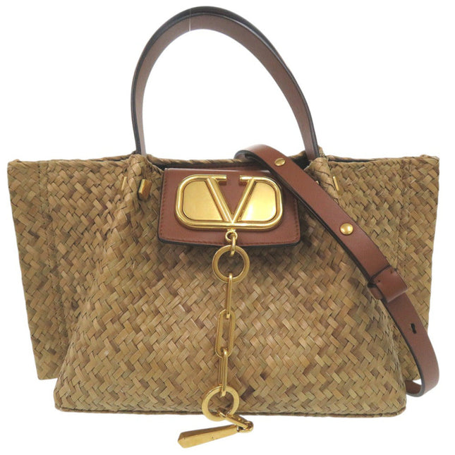 Valentino Garavani pre-owned straw bag with gold accents and brown leather straps