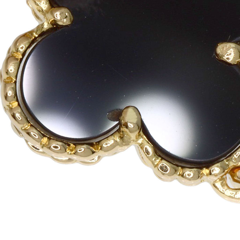 Used Van Cleef 18K gold bracelet featuring a beautiful black onyx centerpiece in a classic clover design