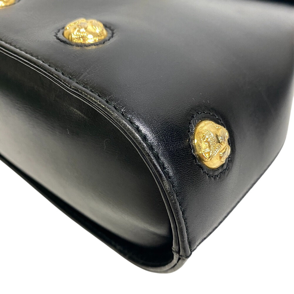 Salvatore Ferragamo vintage black leather bag with gold-tone embellishments for a classic look